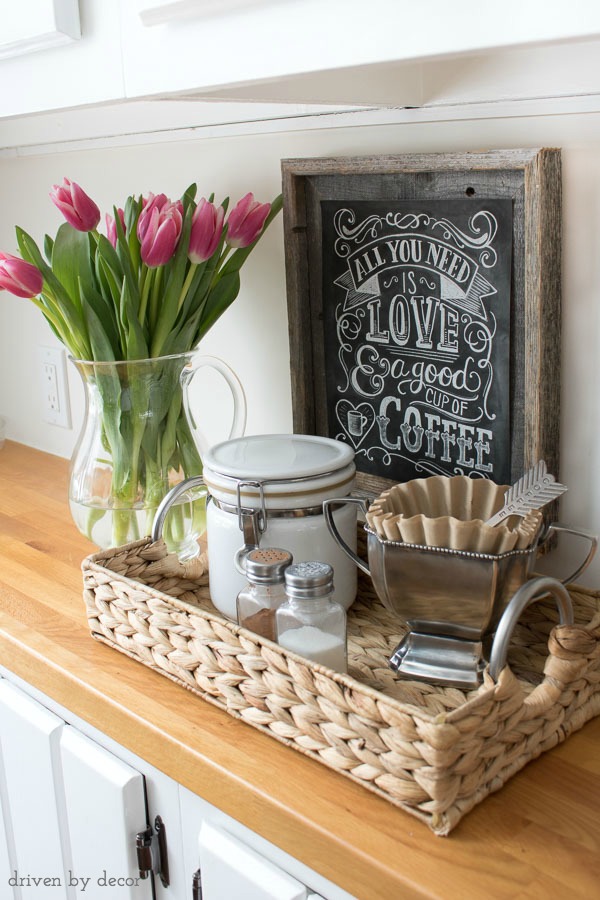 Use a small tray to corral your coffee-making supplies for a simple at-home coffee station!
