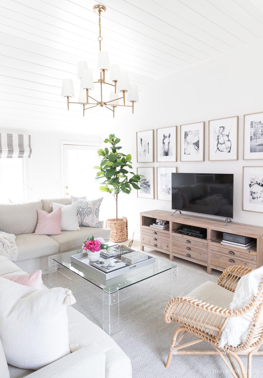 LOVE this acrylic coffee table! So perfect for a family room!