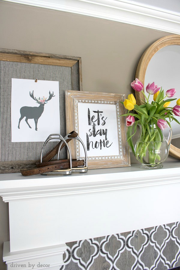 Spring fireplace mantel decorated with inexpensive printables (links to printables in post!)