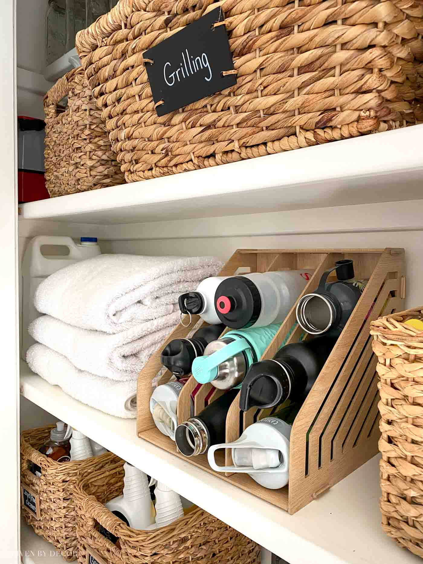 Love this kitchen organization idea for storing water bottles - so smart!
