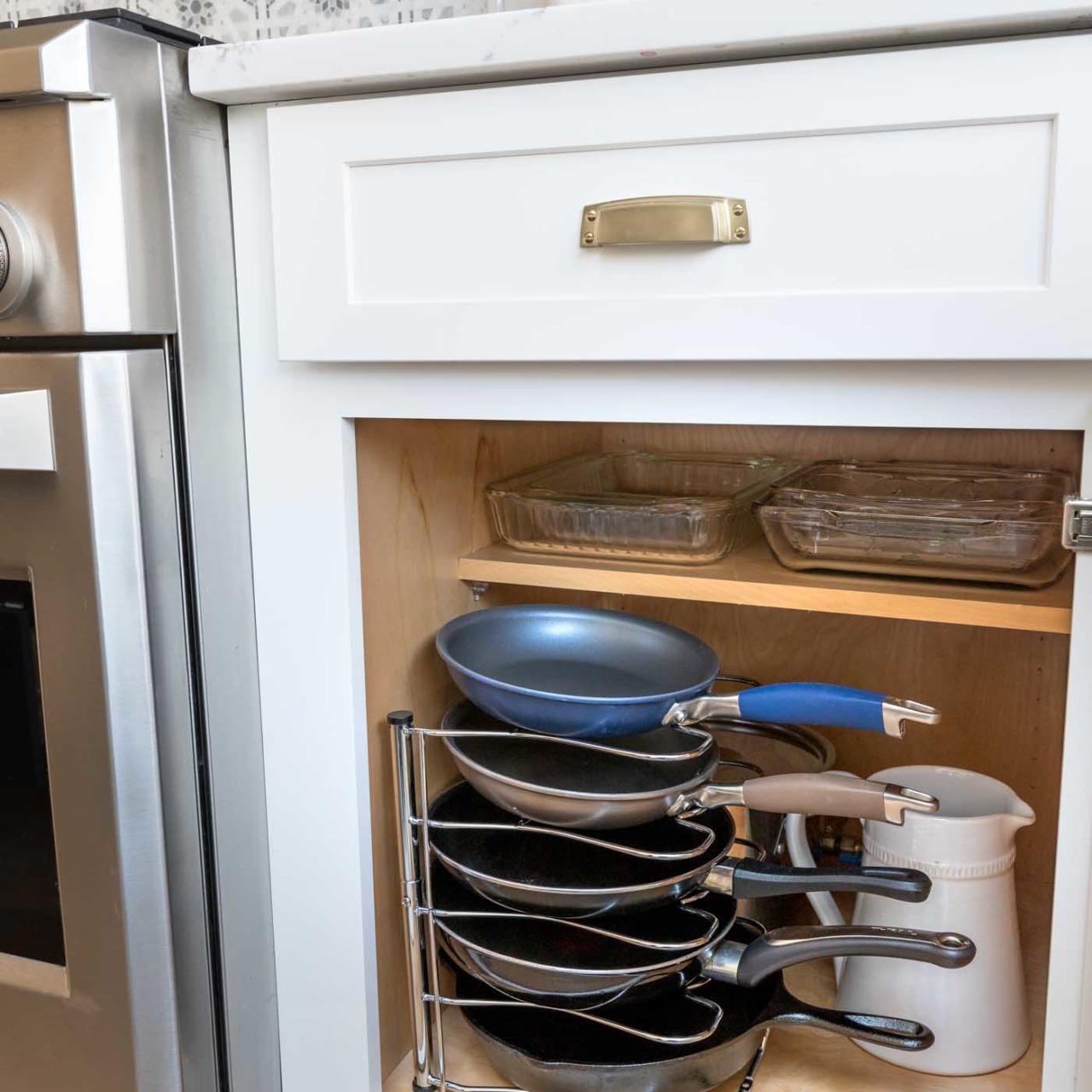 A smart way to store pans in your kitchen cabinets!