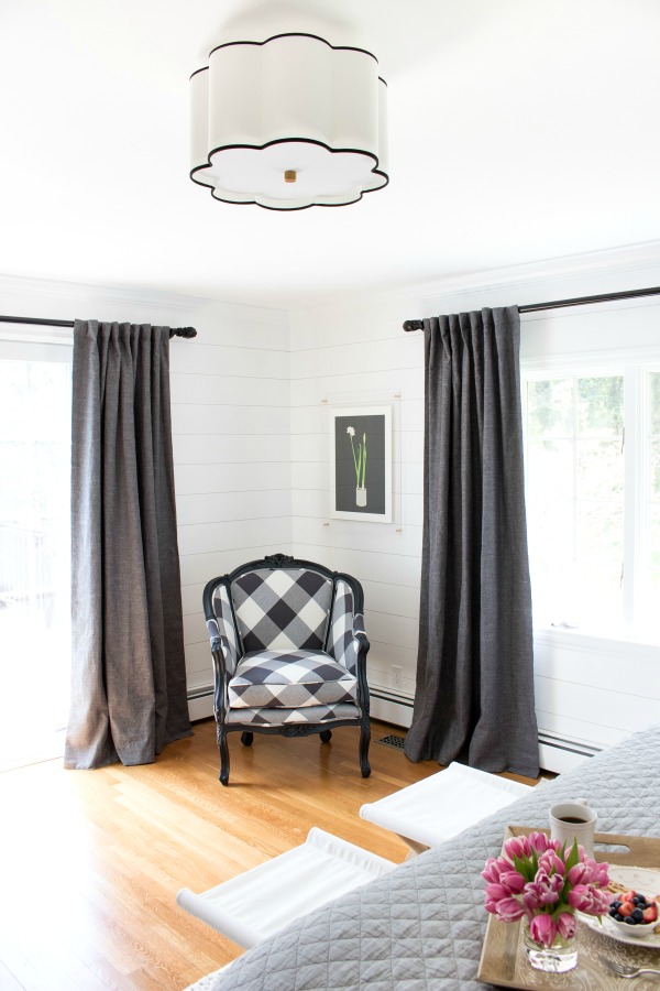 Fabulous flushmount light fixture and LOVE the buffalo check chair!