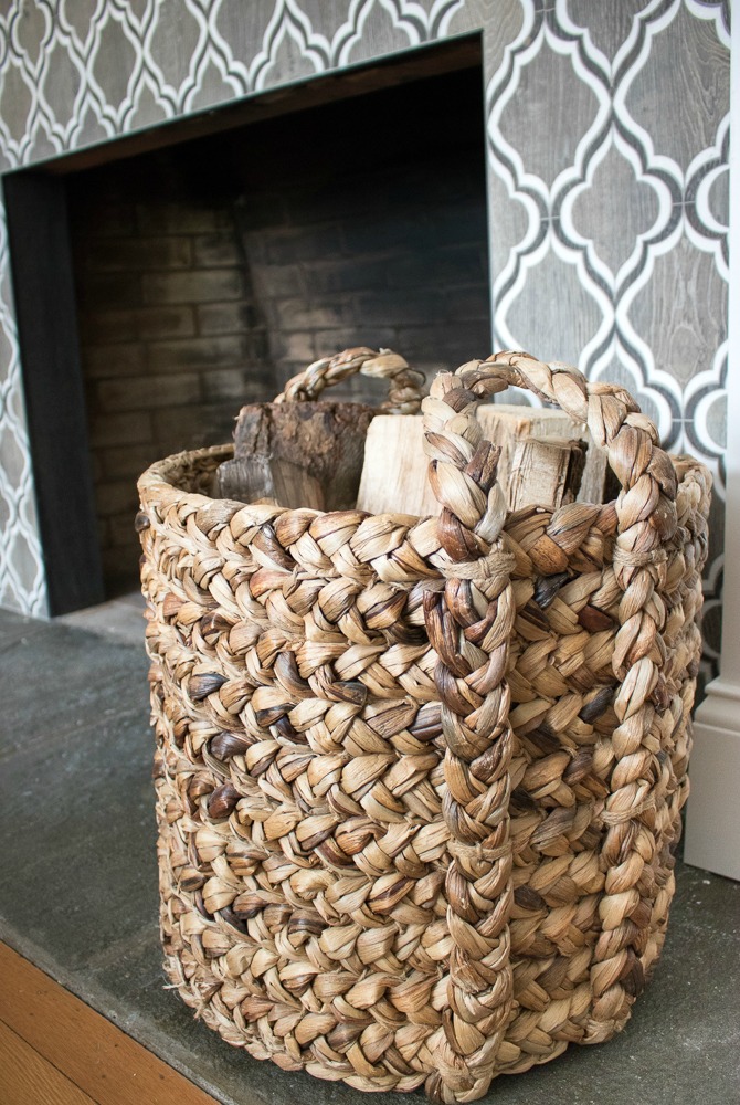 Basket used to store logs by the fireplace - love this idea!