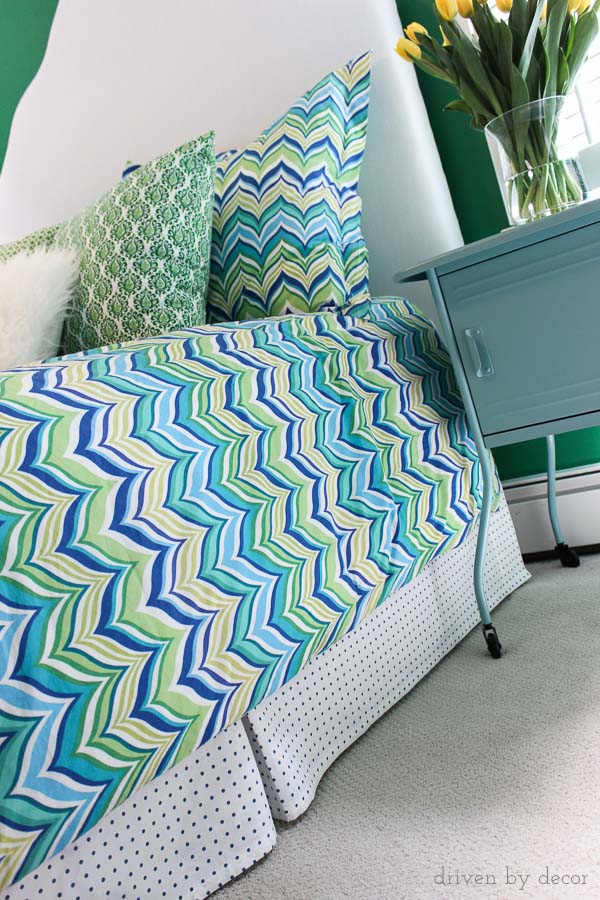 Custom bed skirt made from a simple flat sheet - cheap, easy, and you get a custom fit!