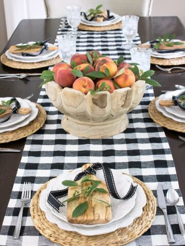 Peaches make a stunningly simple fall centerpiece in this beautiful scalloped wood bowl!