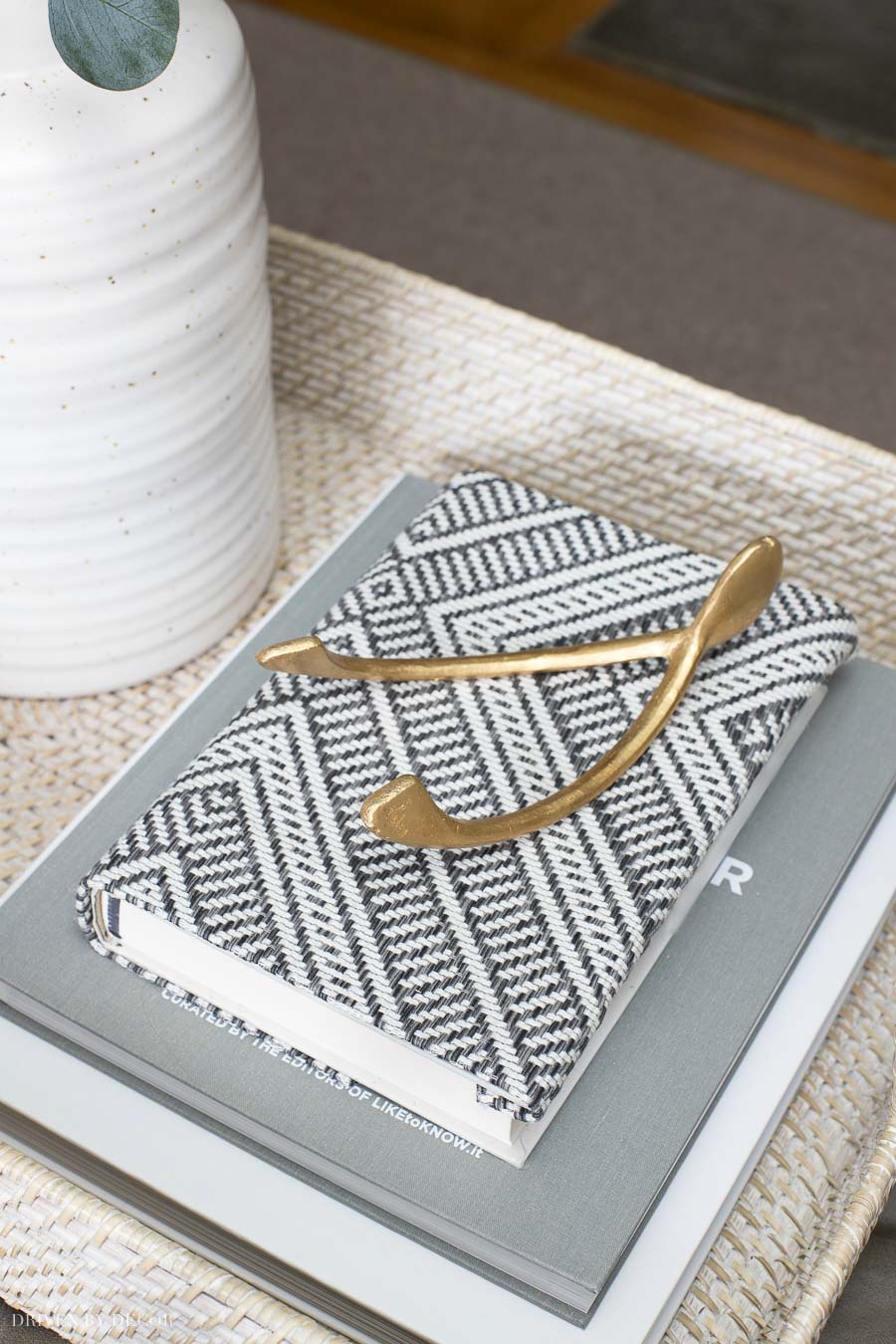 Love the idea of using a favorite fabric remnant to cover a book as part of your coffee table decor!