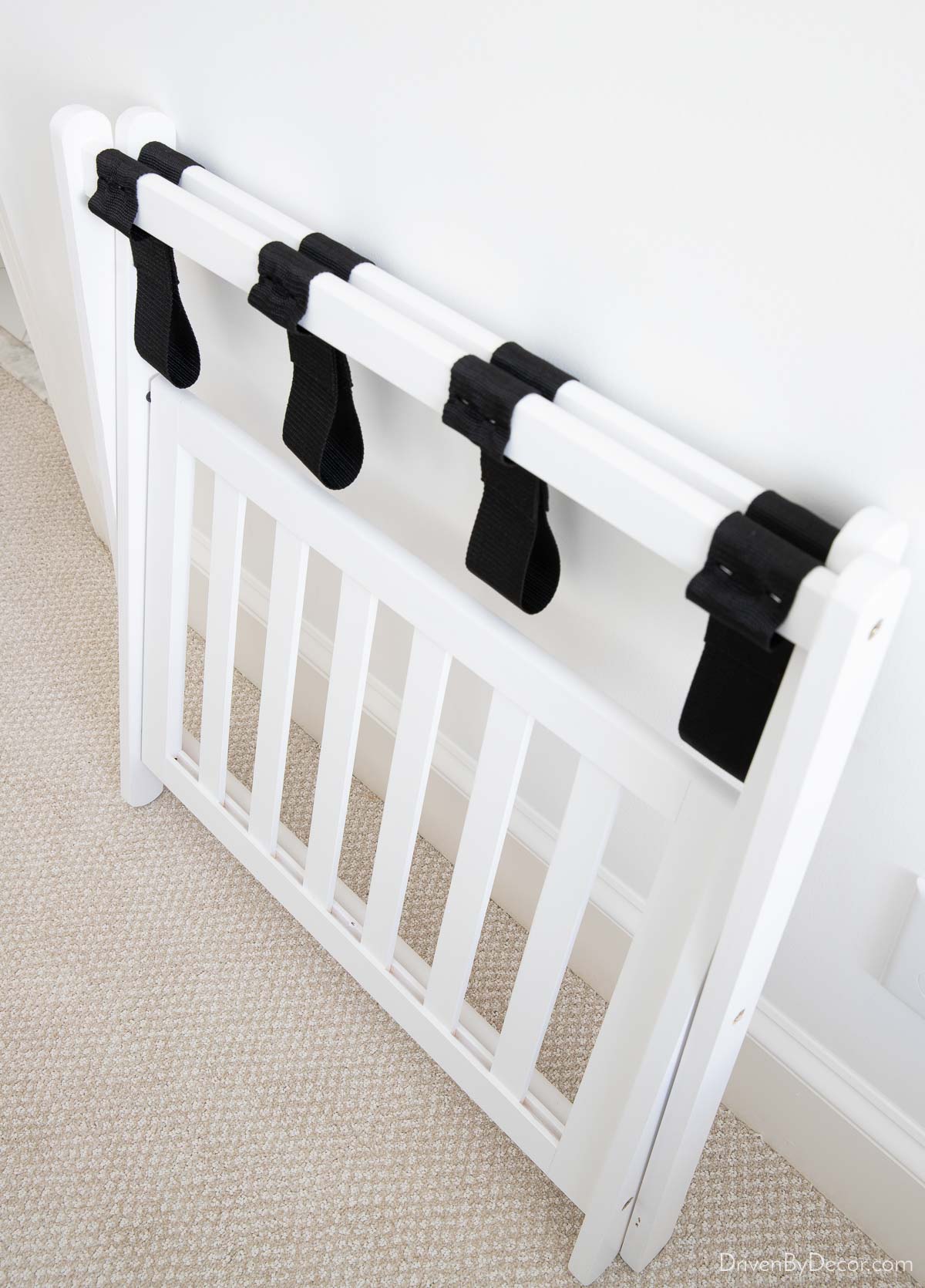 Folded luggage rack in bedroom