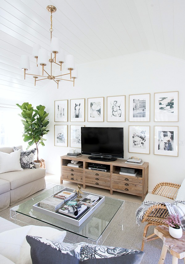 Family room with fabulous art wall around the TV