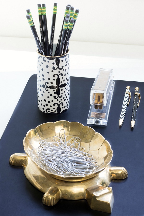 Fun desk accessories - gold stapler, Jill Rosemwald pencil holder, and brass turtle dish for paper clips