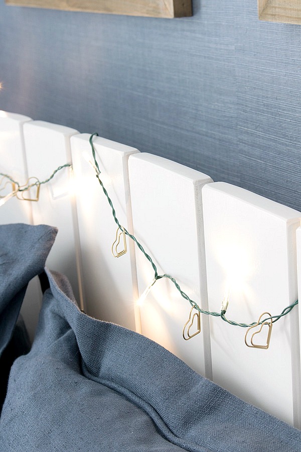 Gold paperclip hearts added to a strand of twinkle lights for a simple, sparkly Valentine's Day garland