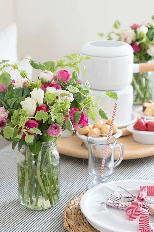 A mix of ranunculus and roses for a Valentine's Day bouquet