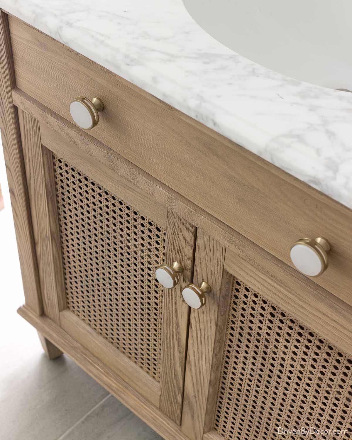 Love these acrylic and gold knobs for bathroom cabinets!