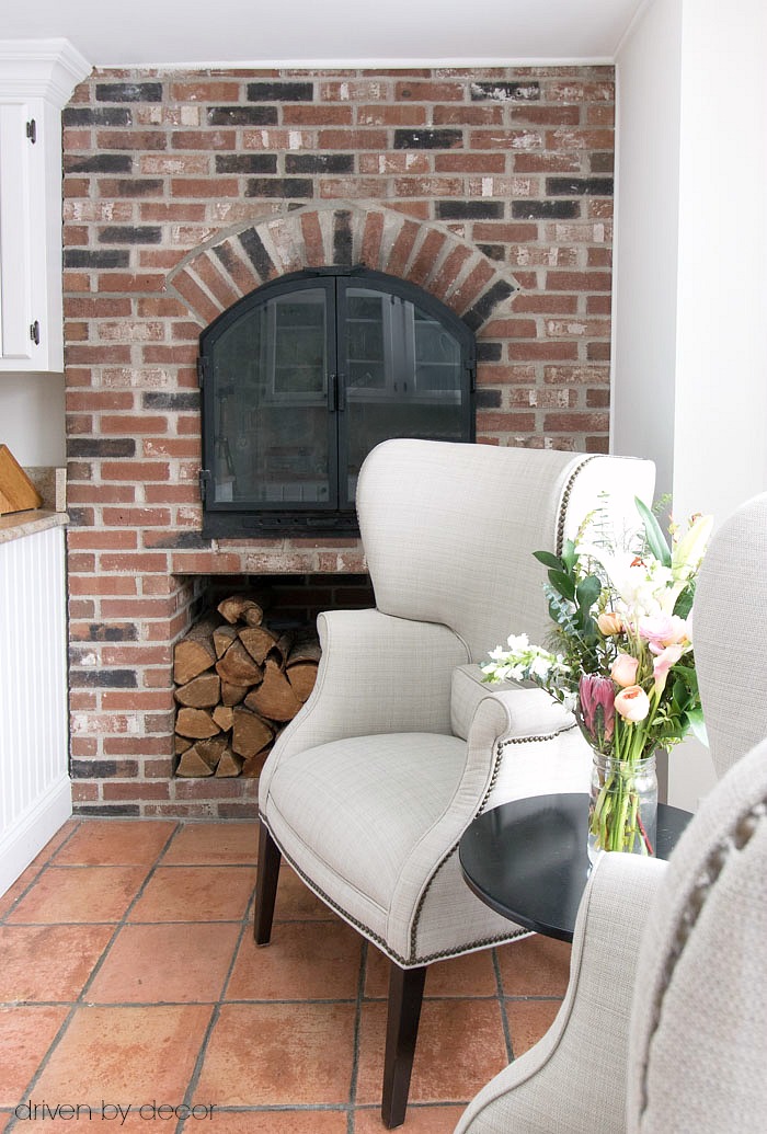 The brick fireplace in our New England kitchen