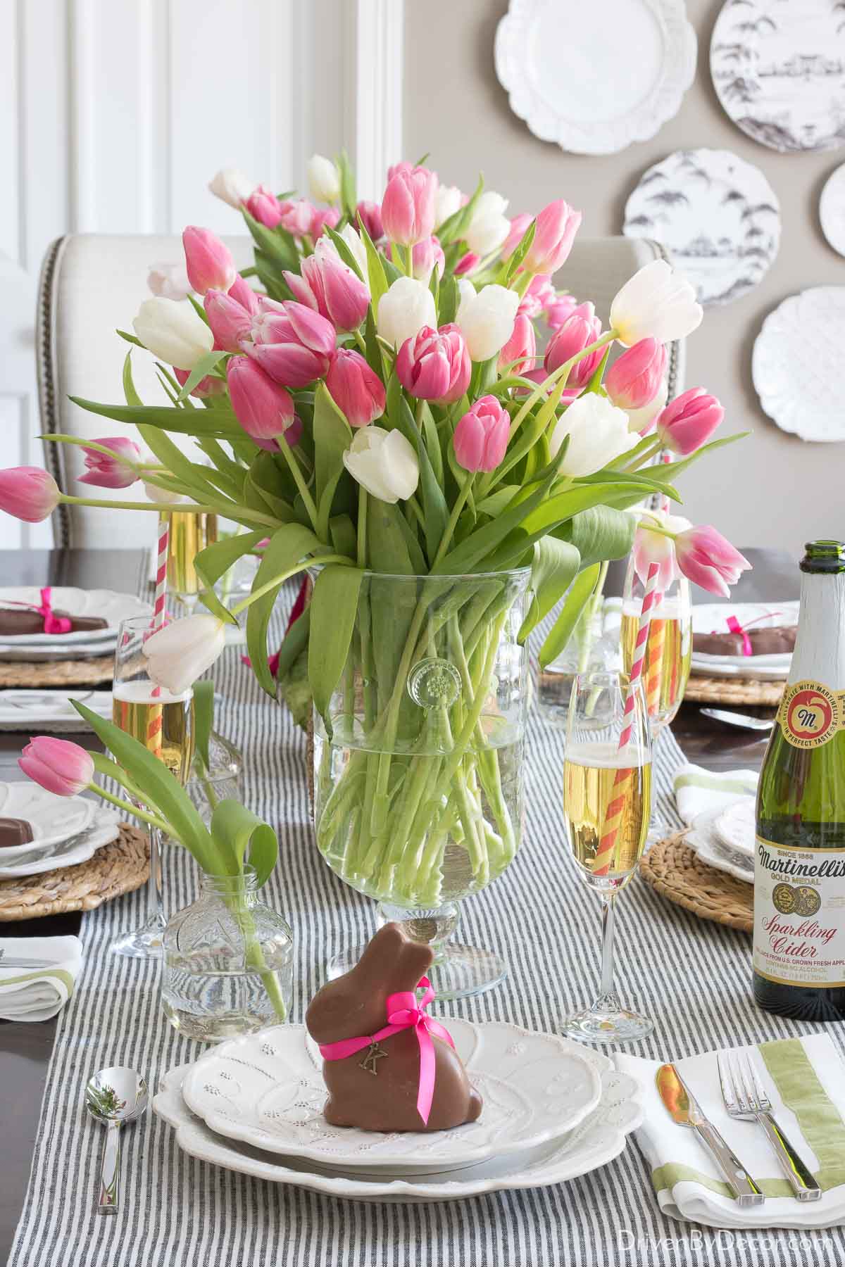 Chocolate bunny on plate with vase full of tulips