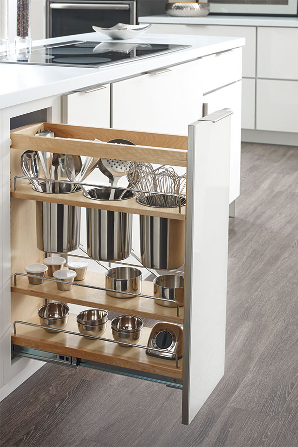 A kitchen cabinet pull-out for storage of kitchen utensils - I need this!!