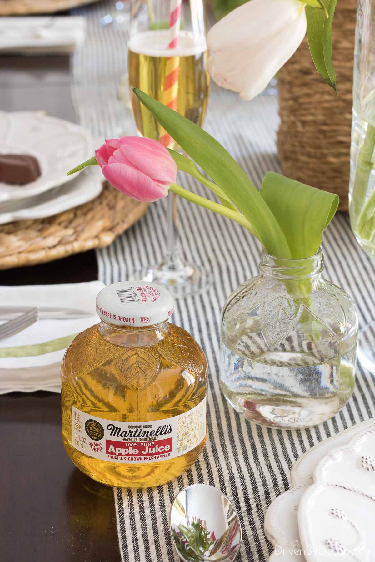 Small apple juice bottles turned into vases