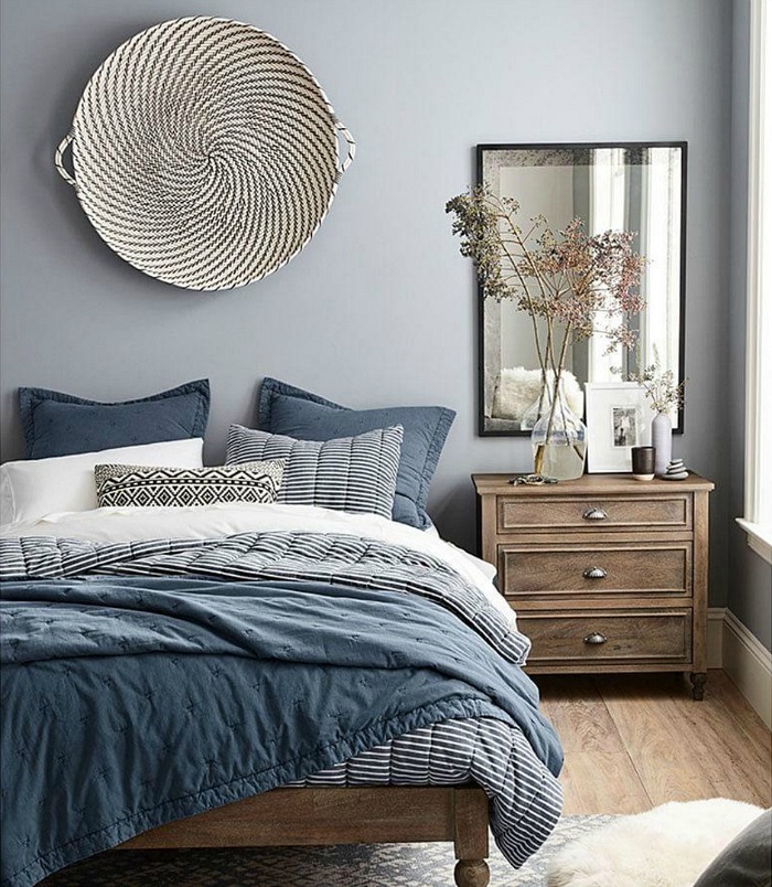 Not sure what to hang over your bed? A large, shallow woven basket is a simple, beautiful idea!