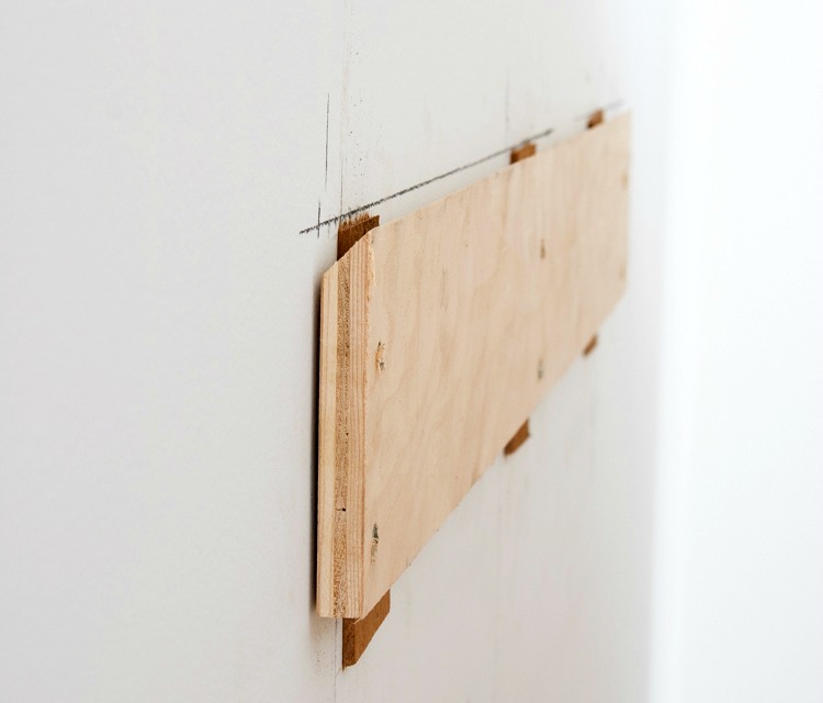 Wood cleat for hanging headboard on the wall