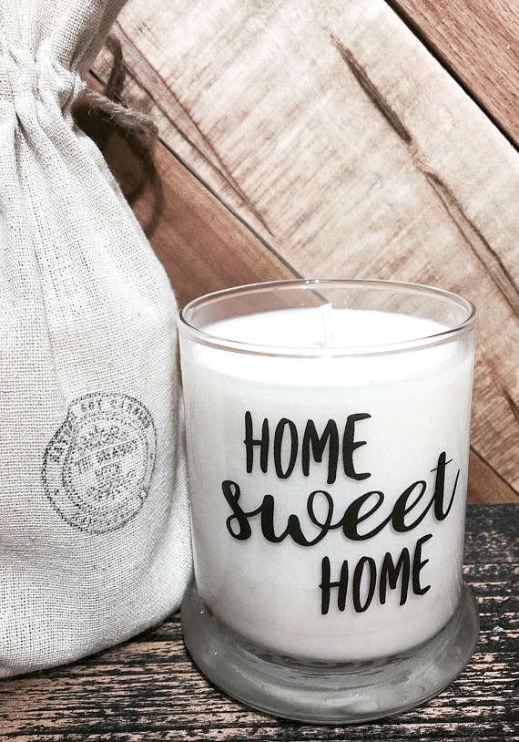 The perfect hostess gift! A personalized candle wrapped in a linen gift bag