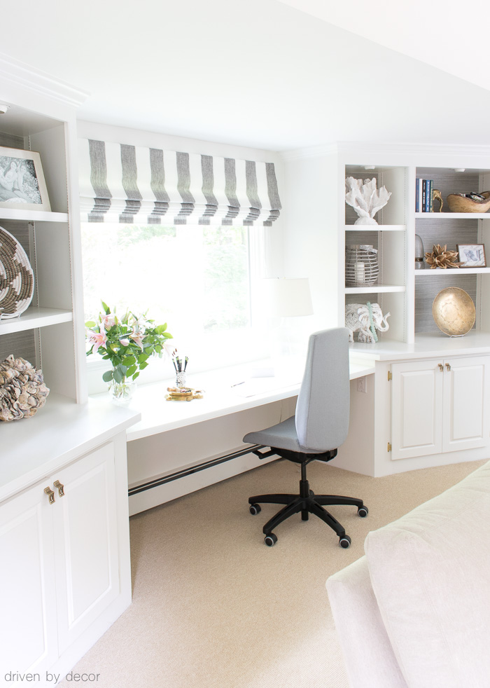 Home office desk between bookcases in family room