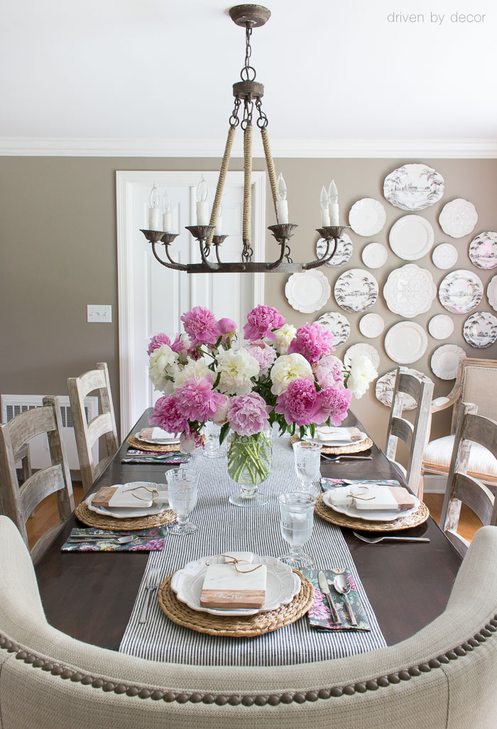 Summer entertaining with a simple pink and white tablescape - love the simple vase filled with peonies (and swooning over that rope chandelier!)