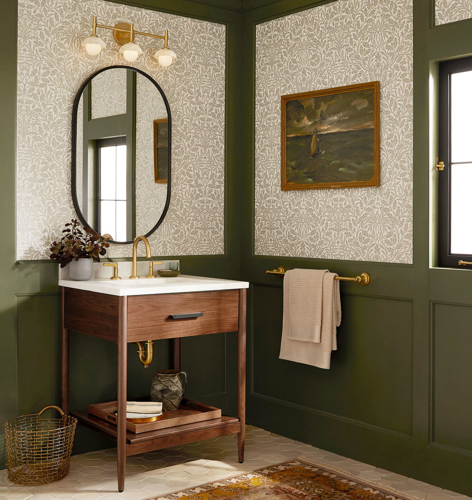 An elongated mirror over a bathroom sink gives the illusion of higher ceilings