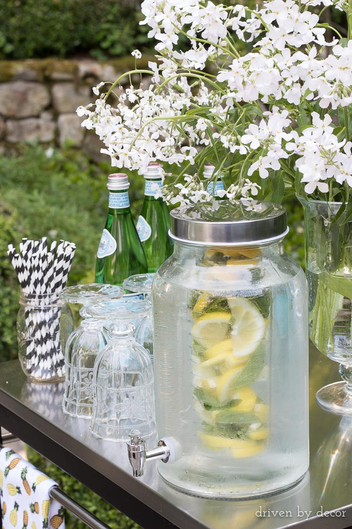 A glass drink dispenser with an infuser for fruit is perfect for summer entertaining!