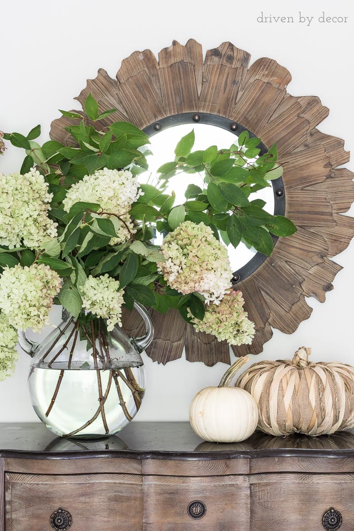 Love this oversized glass jug vase filled with hydrangeas!