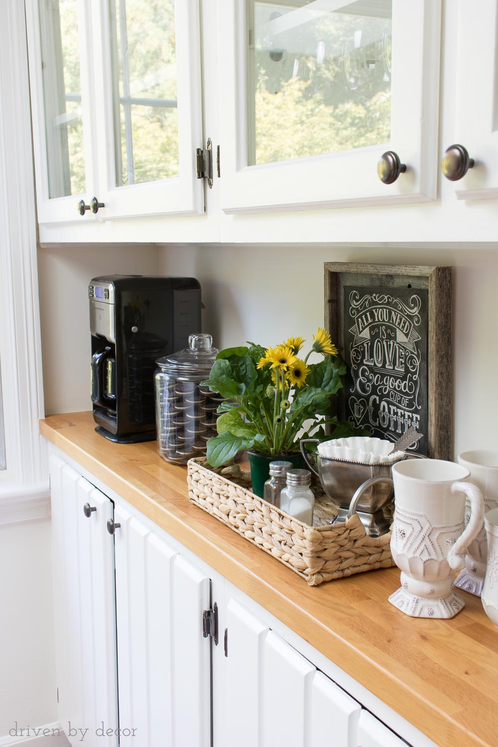 Butcher block countertops sealed with Waterlox to create a cute kitchen coffee station