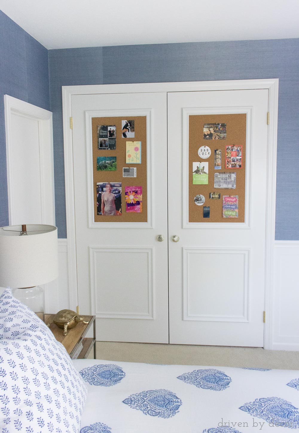 Molding and cork added to flat closet doors to create framed bulletin boards!