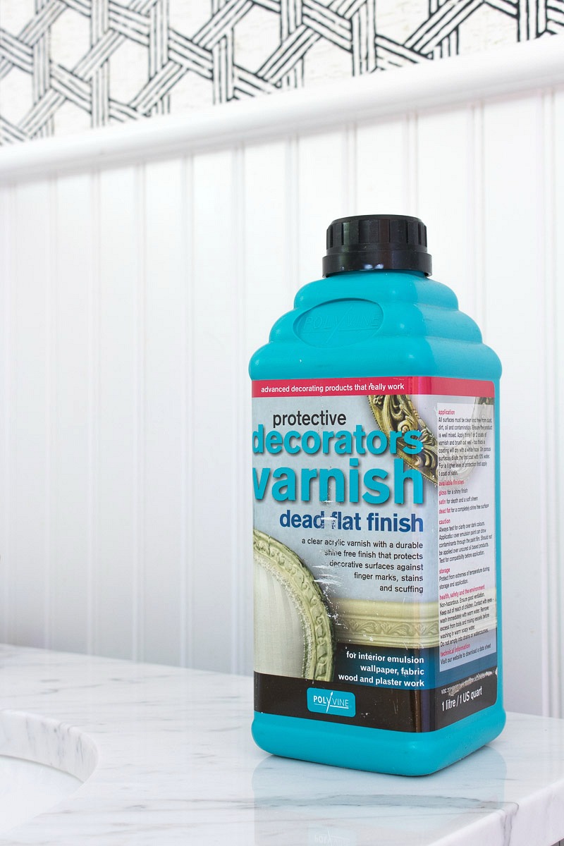 The secret weapon to making wallpaper work in bathrooms is this flat finish varnish sealer! More details in the post!