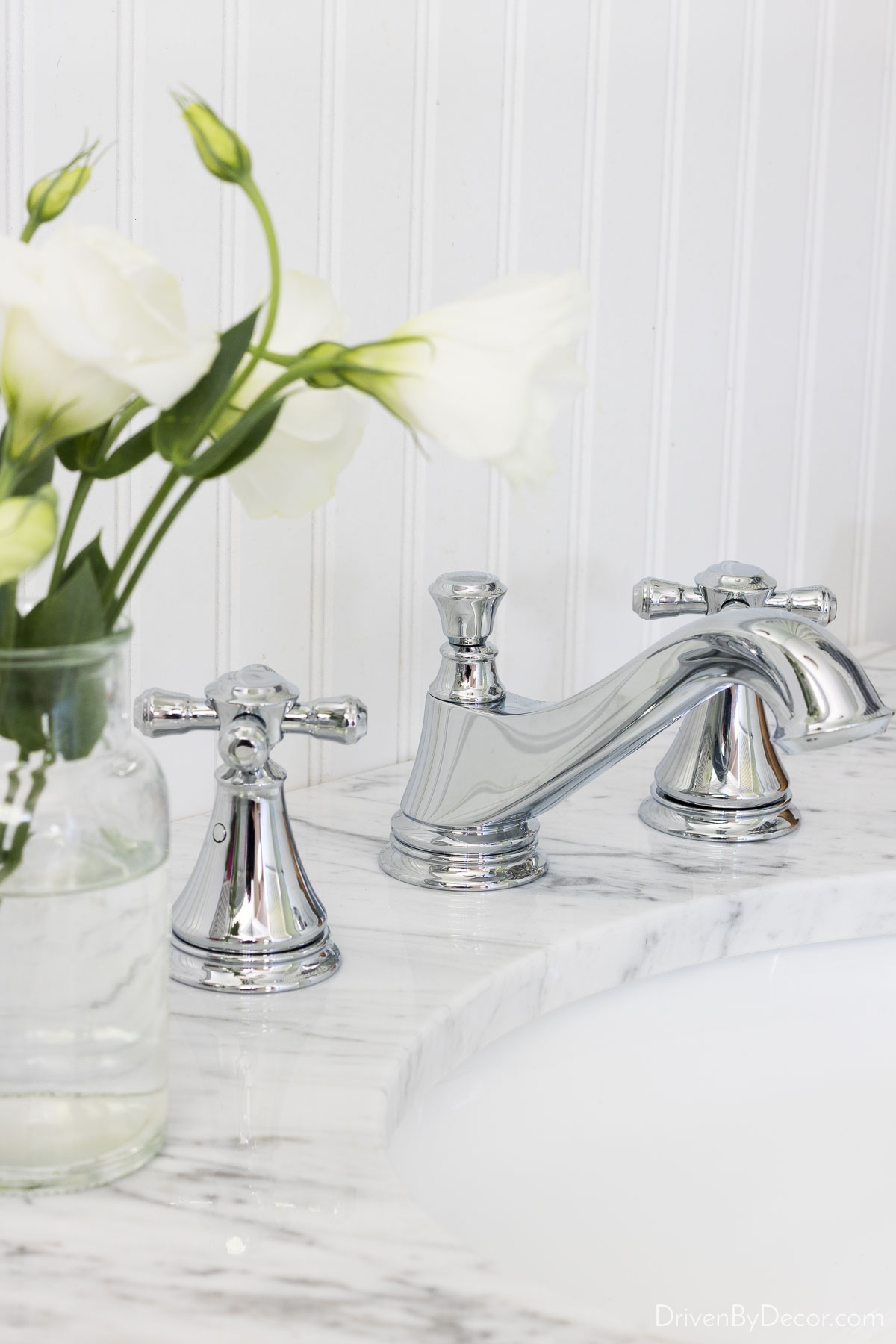 A small vase of flowers added to our guest bathroom
