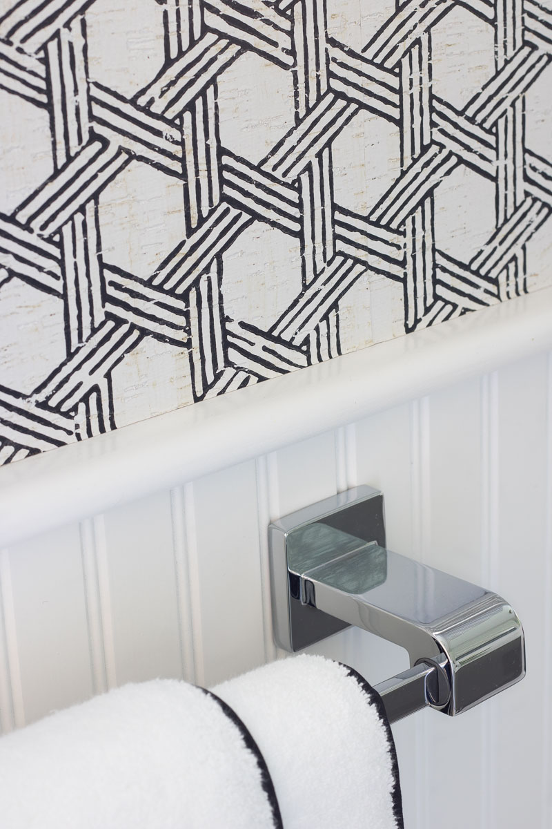 Love this black and white textured cork wallpaper! Great tips in this post about hanging wallpaper in bathroom and how to make it work!