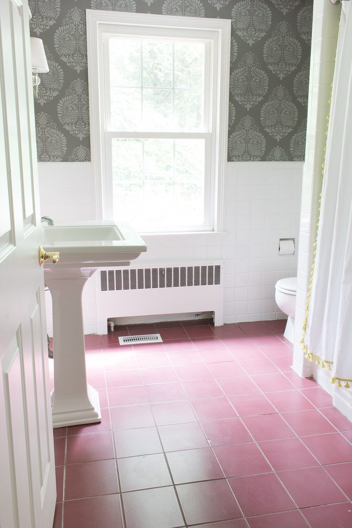 "Before" photo of ugly bathroom ceramic tile floors before they were painted