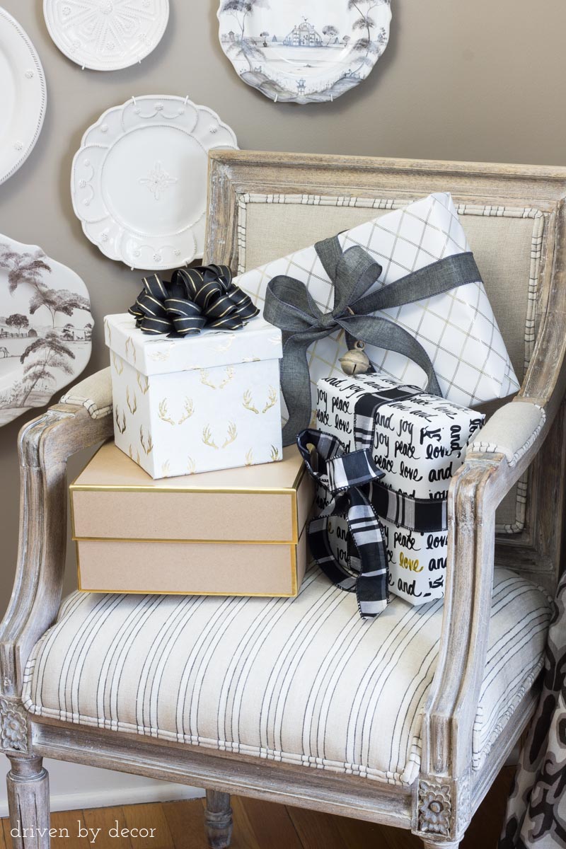 Love the idea of using wrapped presents to decorate your home for the holidays! One of the great stress free holiday tips in this post!