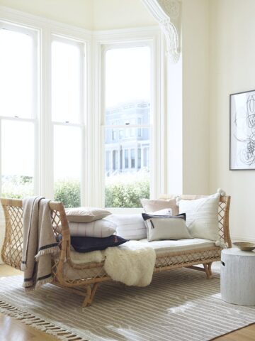 Gorgeous rattan daybed - one of many beautiful options in this post about the best daybeds!