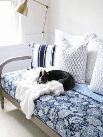 Great tips on where to start when decorating your bedroom. Love the combination of this colorful Vera Bradley bedding with the warm wood daybed and brass floor lamp!