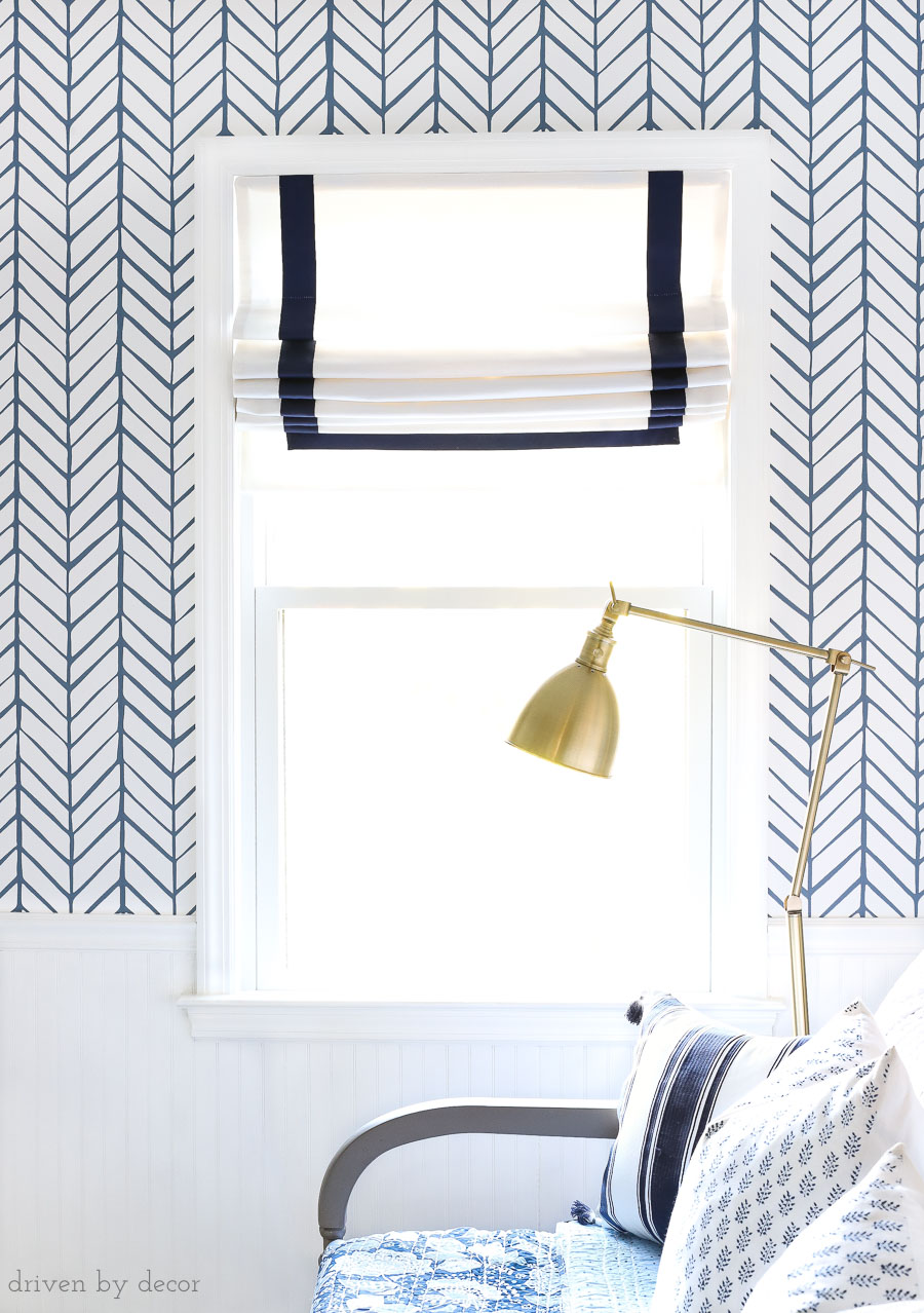 Gorgeous custom Roman shades with navy ribbon trim for the same price as non-custom shades at a big box store! Source linked in post!