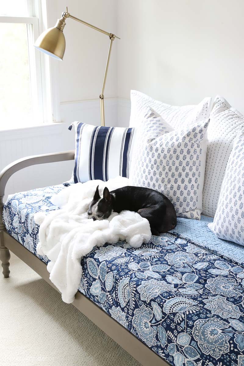 Great tips on where to start when decorating your bedroom. Love the combination of this colorful Vera Bradley bedding with the warm wood daybed and brass floor lamp!