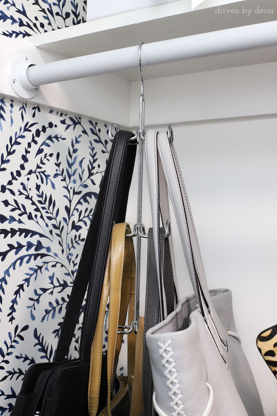 I need one of these hanging organizers to organize my purses and totes in my closet!