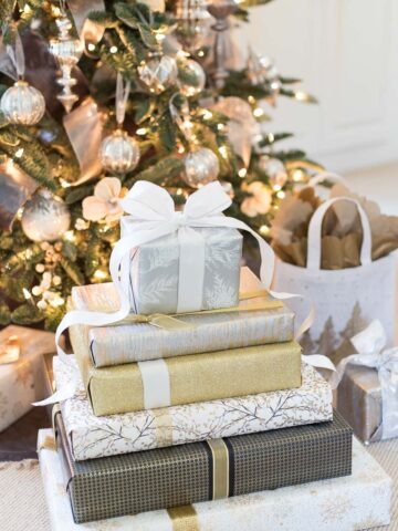 Loving the gold and silver metallics gift wrap and ribbon and how it all coordinates so well together!