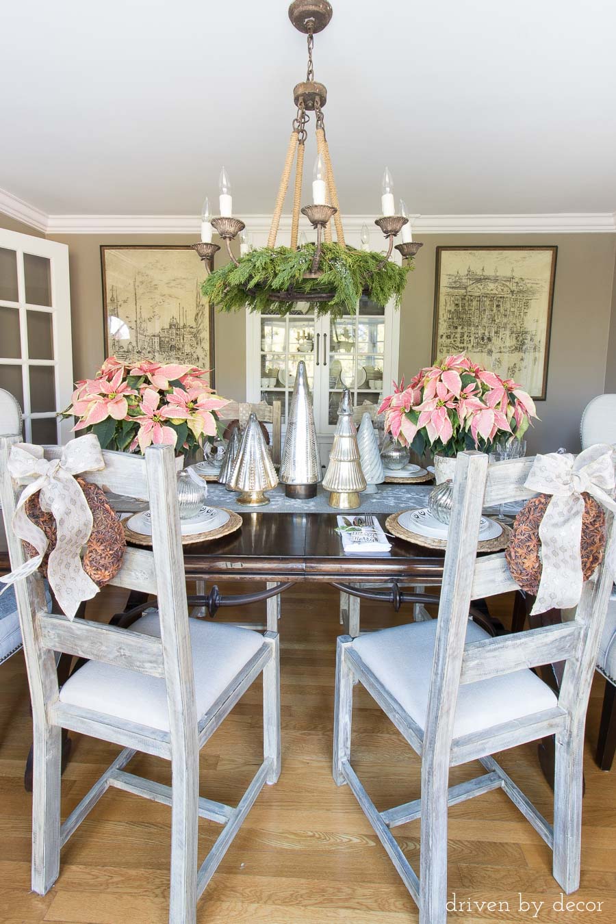 Love the star anise wreaths tied onto the backs of her dining room chairs for Christmas!