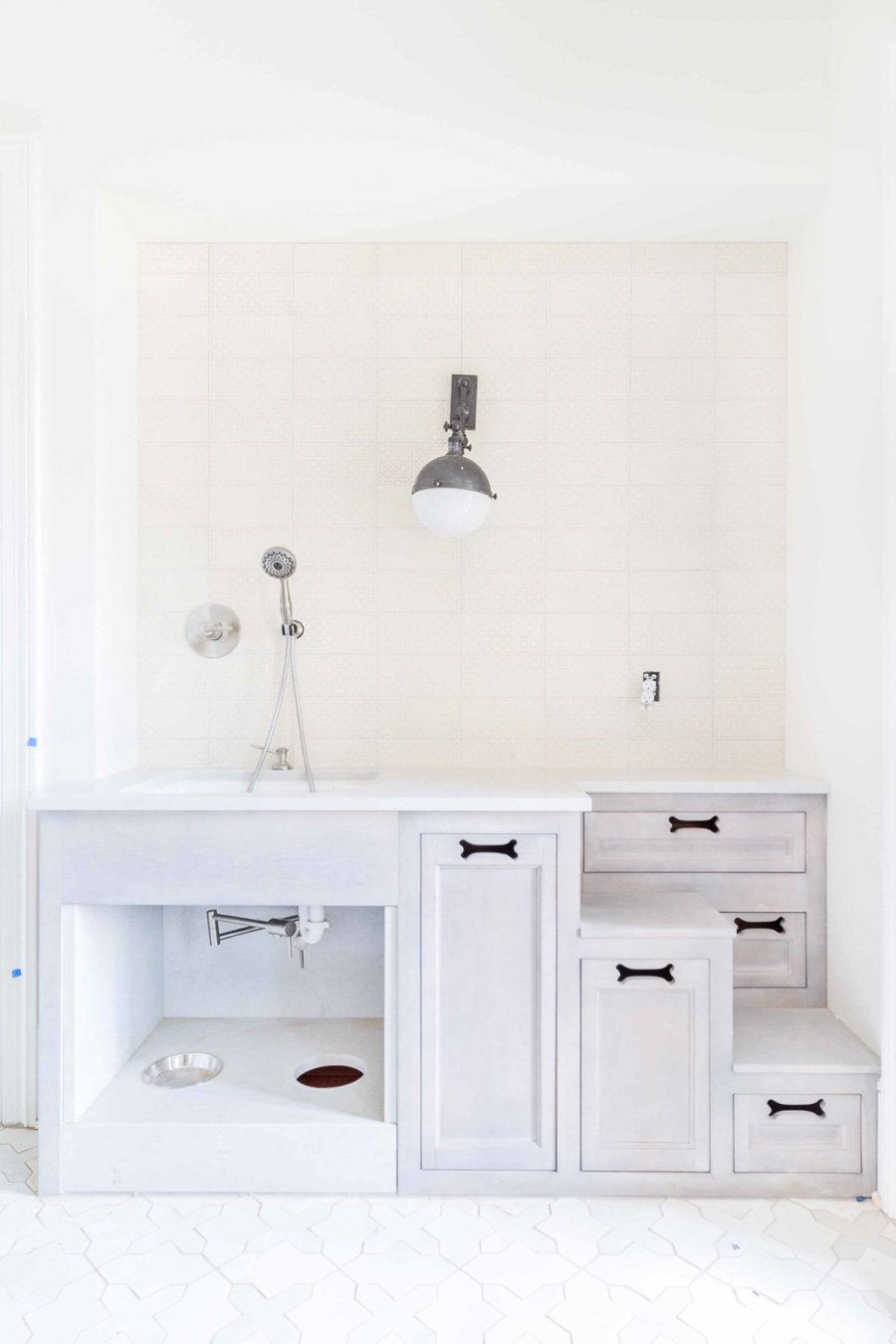 Amazing! Love this built-in dog wash sink and food bowls - design by Lori Paranjape