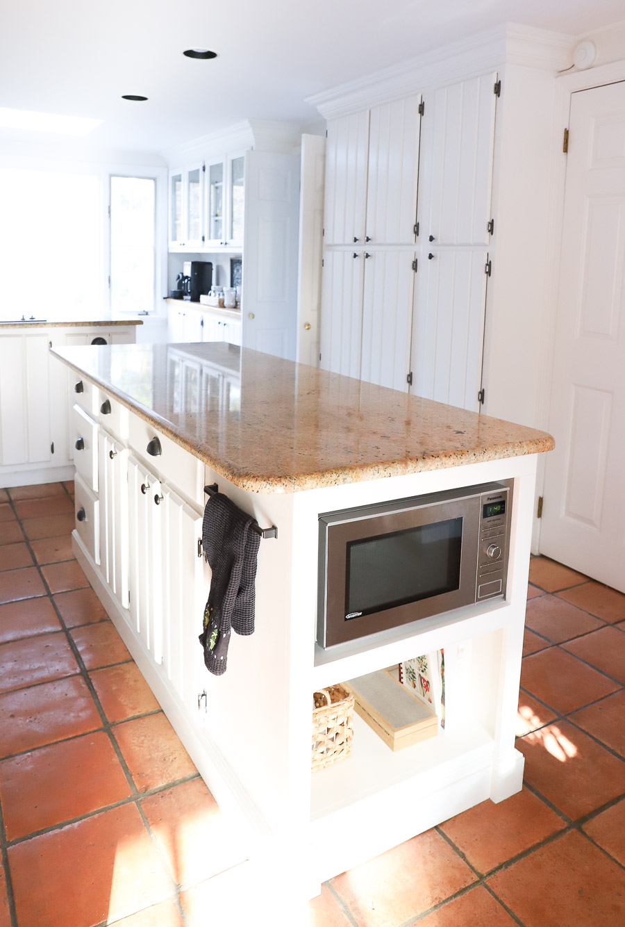 Our kitchen island and pantry before our remodel