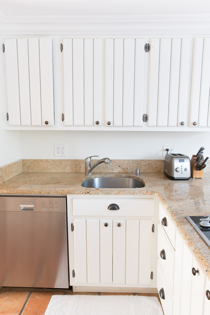 Our kitchen sink and cabinetry before our remodel