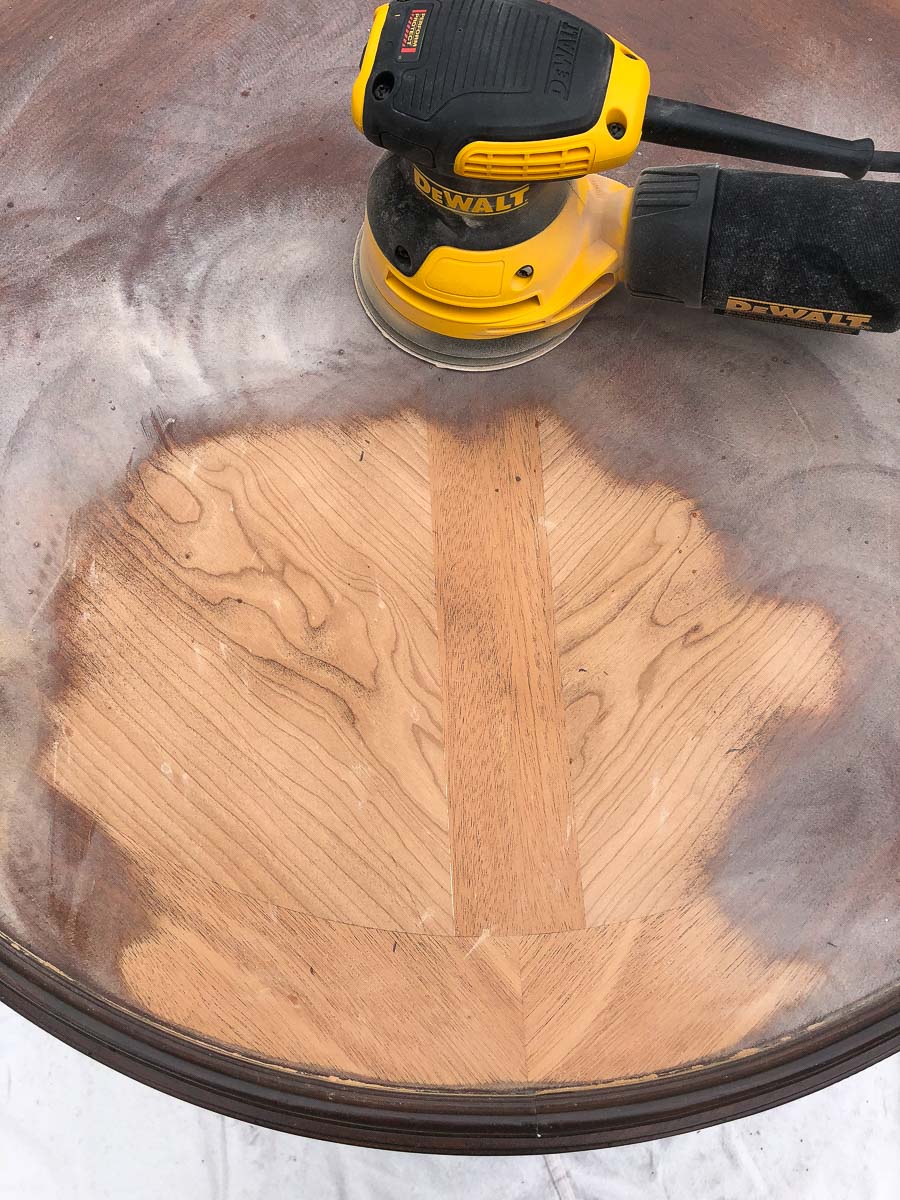 Gorgeous finish revealed underneath the old stain! Love the final results of this transformation - click through to see for yourself!!