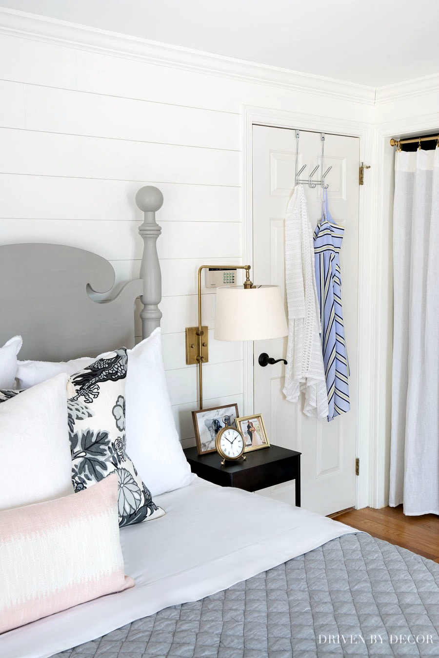 Add hooks over the back of a door with this simple three hook door hanger