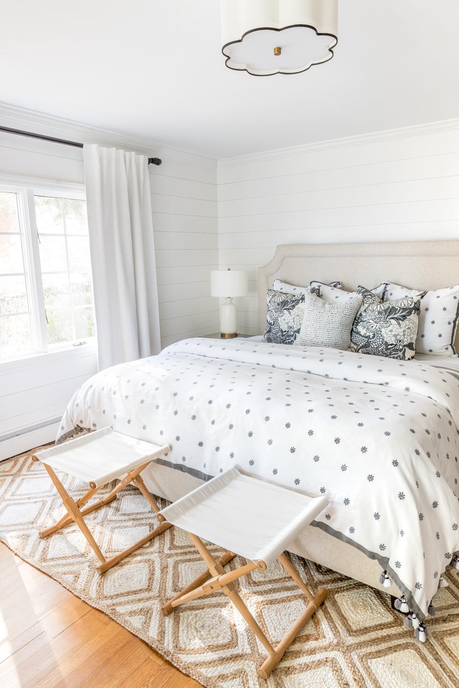 Love the shiplap walls in this bedroom - this post tells you how to do it!