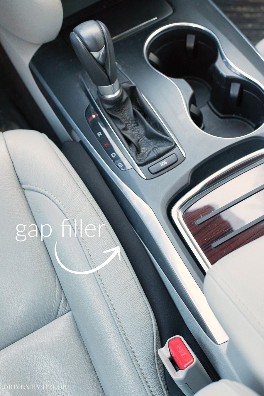 OMG I need this in my life! A car seat gap filler so there's no more cell phones or anything else falling down in that hard to reach spot between your seat and center console!