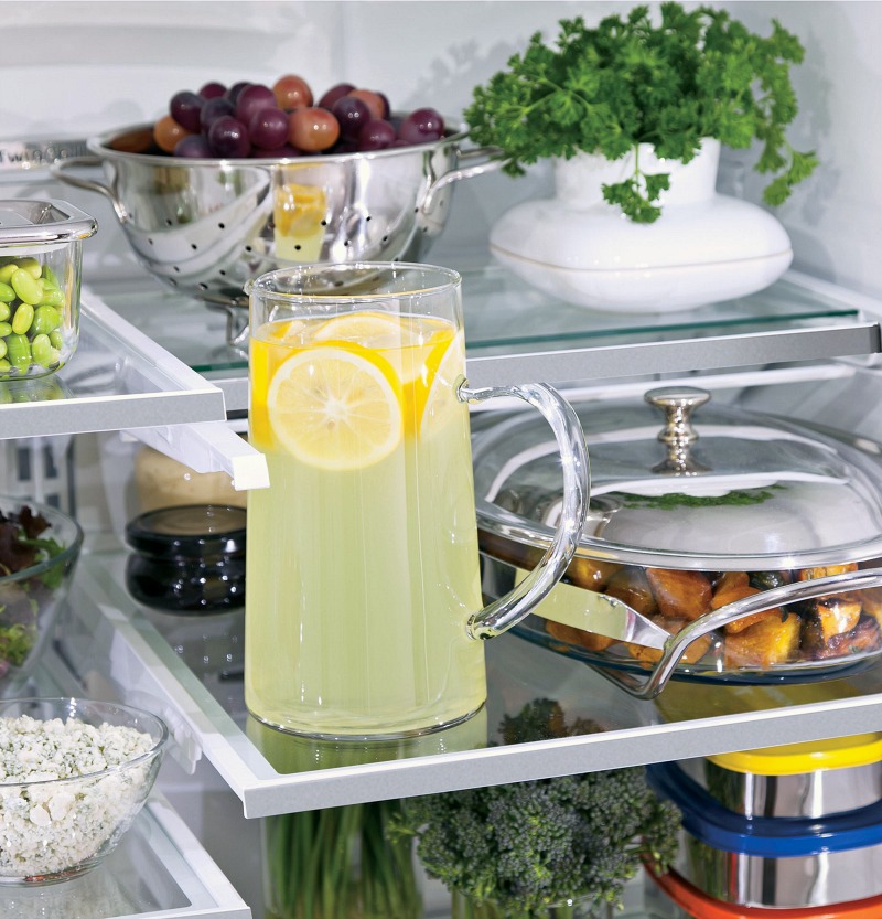 Love this quick space shelf in Monogram refrigerators that functions as a full sized shelf when you need it and slides down for storage when you don't!